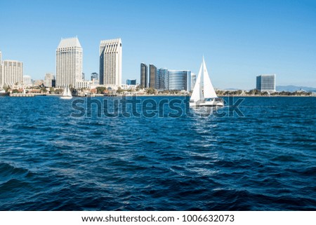 San Diego skyline with a little sailing boat, view from Coronado island 