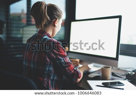a young casual dressed modern student is looking for a job to practice after completing her studies at the university. a professional IT specialist uploading new content to the website. Blank screen