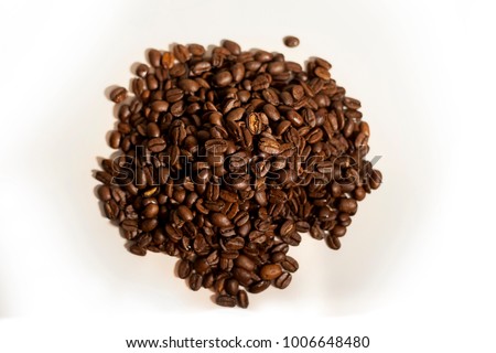Isolated pile of fresh coffee beans