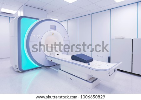 MRI - Magnetic resonance imaging scan device in Hospital. Medical Equipment and Health Care. Royalty-Free Stock Photo #1006650829