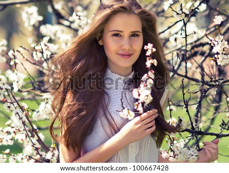 A portrait of a beautiful young girl outdoor