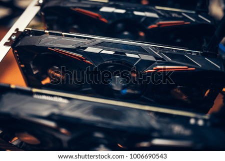 Close up details of graphics cards on cryptocurrencies mining rig. Modern technology 