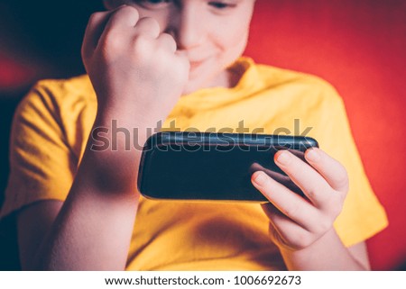 The boy wins in a computer game