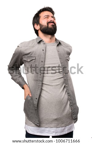 Handsome man with beard with back pain on white background