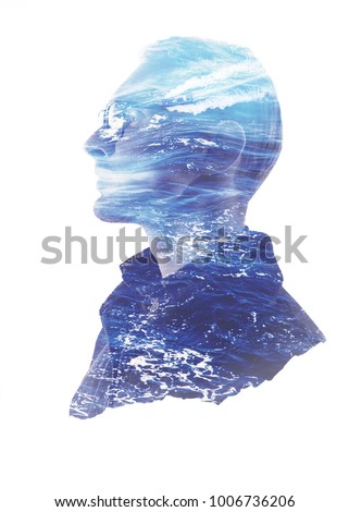 Double exposure silhouette head portrait of a thoughtful man combined with photograph of blue ocean waves. Conceptual image showing unity of human with nature. Ecology, freedom, environment