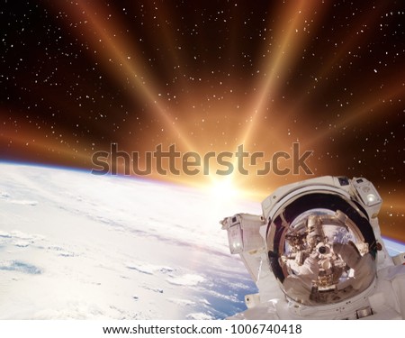 Astronaut and light. The elements of this image furnished by NASA.
