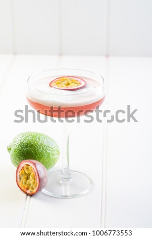 passion fruit cocktail fancy clean beverage alcohol drink lime mixed bartender white background