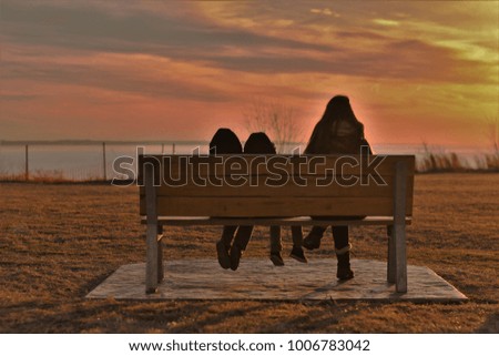 Mother and Children watching sunset