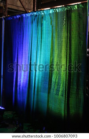 Panels of fabric with vertical bands of color.