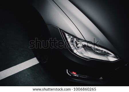 Modern car wrapped in grey color matte vinyl Royalty-Free Stock Photo #1006860265