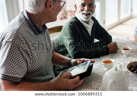 Group of senior friends hanging out together Royalty-Free Stock Photo #1006889311