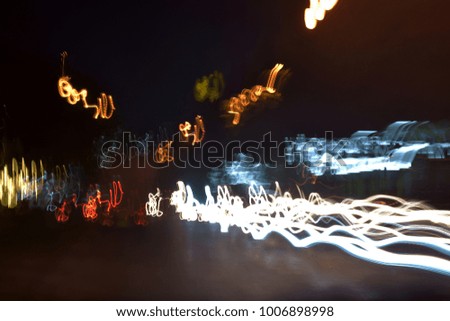abstract motion blur messy light caused by the car on the road