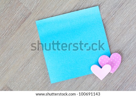 Blue post it note with  little hearts