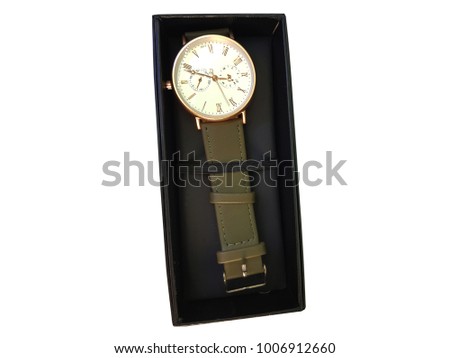 Green wrist watch On a white background.Made from leatherette.Watch
Time display screen Hour ,minute ,second. Have a look at the time. 