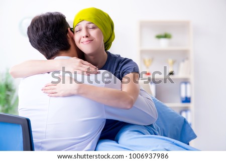 Cancer patient visiting doctor for medical consultation in clinic Royalty-Free Stock Photo #1006937986