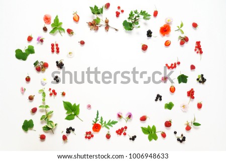 summer concept with flowers and berries