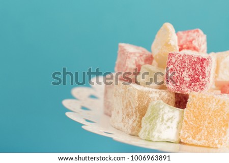 Turkish delight close up on green background