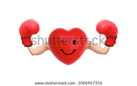Clipping path. The Photo of heart with muscular boxing arms. The concept of a strong heart