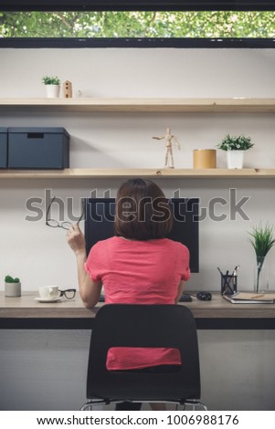Young woman freelancer with computer in room area working at home, Freelance artist lifestyle concept