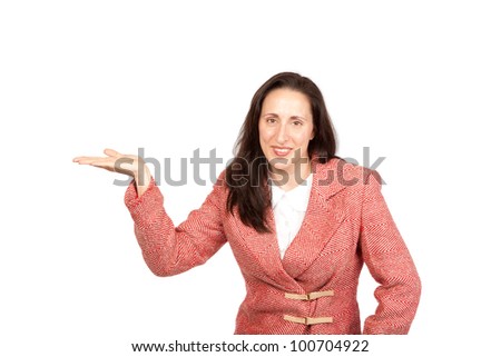 An adult businesswoman wearing a suite on a isolated white background holding a product with upturned hand