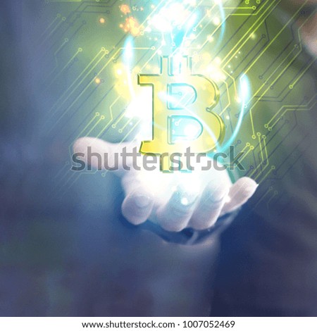 Businessman holding bitcoin symbol. Digital currency, Financial Internet Technology Concept.            