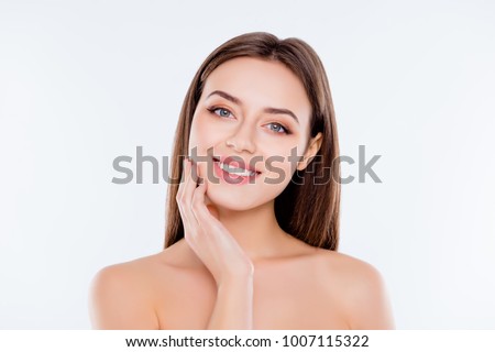 Clean clear pampering wellness freshness rejuvenation concept. Close up portrait of beautiful tender cute pure girl touching her smooth soft flawless perfect skin on cheek isolated on white background