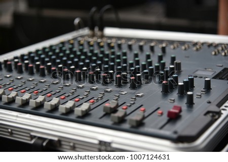 Music mixer equalizer console for mixer control sound device. Sound technician audio mixer equalizer control.Sound Mastering For Radio and TV Broadcast.