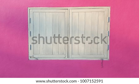 dark pink wall and white windows was closed, background for idea about love