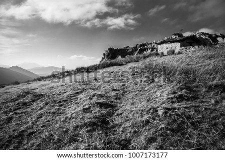 hiking in scenic beautiful countryside in mountains in basque country in black and white, france