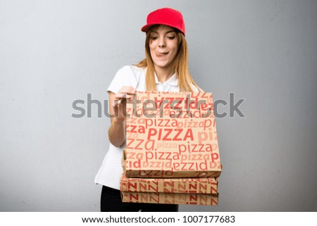 Pizza delivery woman on textured background