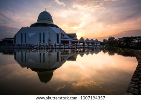 Beautiful view of Public Mosque at Seri Iskandar,Perak,Malaysia during sunrise. Soft focus,blur due to long exposure