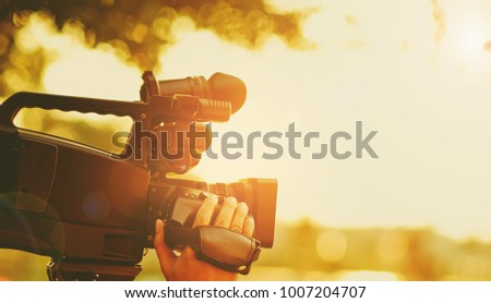 Video camera / videographer close up / cameraman / movie
