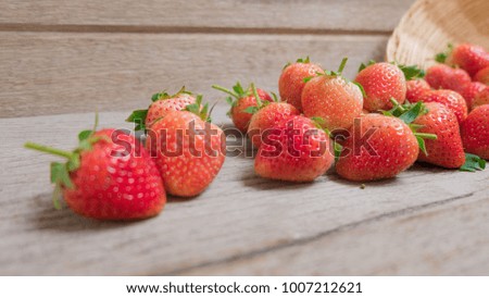 fresh organic strawberries on old wood. organic sweet love concept. 