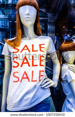 mannequin with sale shirt - photo