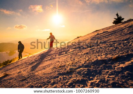 Couple together on ski. Winter sport photo with edit space.