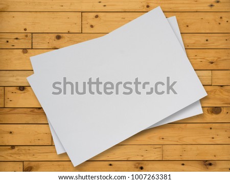 Paper on wood background