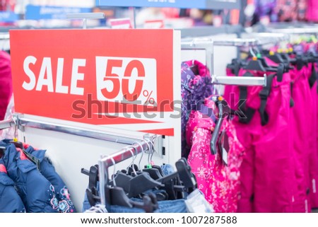 Sale sign in winter clothes shop.shopping and discount concept.  Final Sale Sign In A Clothing Store Selective focus.shopping and discount concept. 