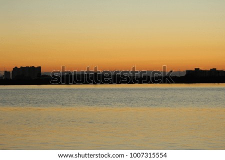 Sunset sky with cityscape 