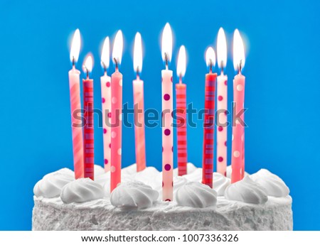 Birthday cake on a colored background