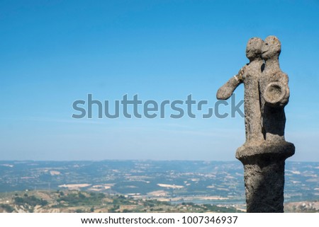 Panoramic view from Lugnano in Teverina (Terni, Umbria, Italy) at summer and statue