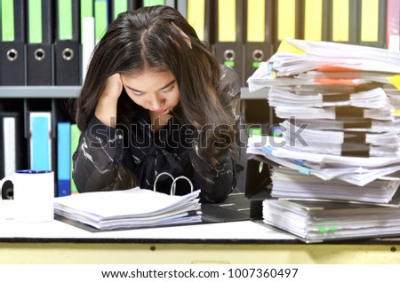 Work hard, Lot of work, Stacks of document paper and files folder on office desk, Office worker worried about her messy project.