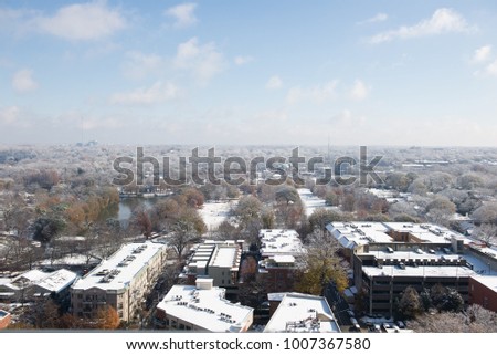 Snow covers residential area of an American city