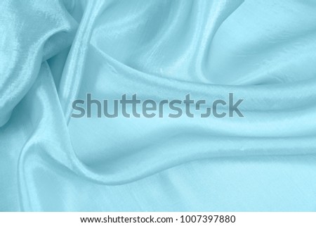 Texture satin fabric blue color for the background