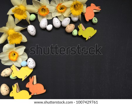 Easter daffodils frame with easter eggs. Concept easter wallpaper. . Concept easter flatlay