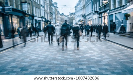 Shopping high street scene with blue filter Royalty-Free Stock Photo #1007432086