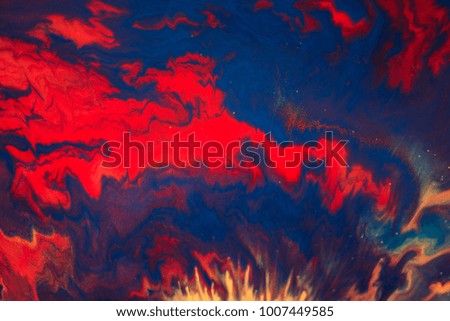Colorful paint background in concept Fantasy luxury texture. Colors dropped into liquid and photographed while in motion. abstract composition.
