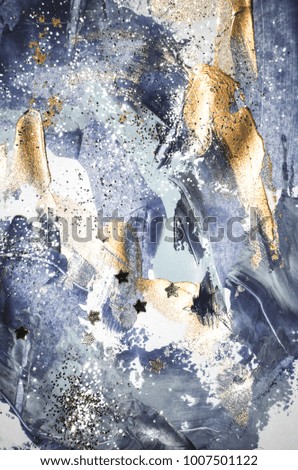 Very beautiful art. Abstract background.  Blue and gold paint. Golden sequins