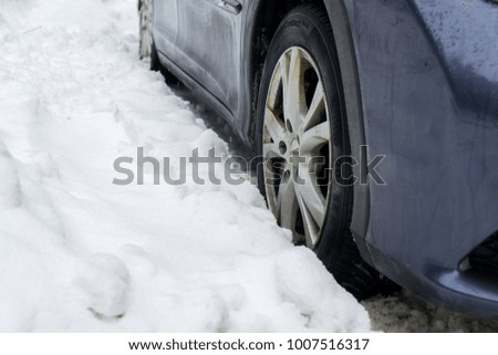 Car tyre in the snow. Slovakia