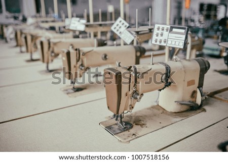 Old sewing machines at an abandoned garment factory