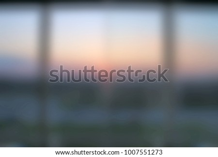 Sunset through a windows. Gaussian blur  Royalty-Free Stock Photo #1007551273